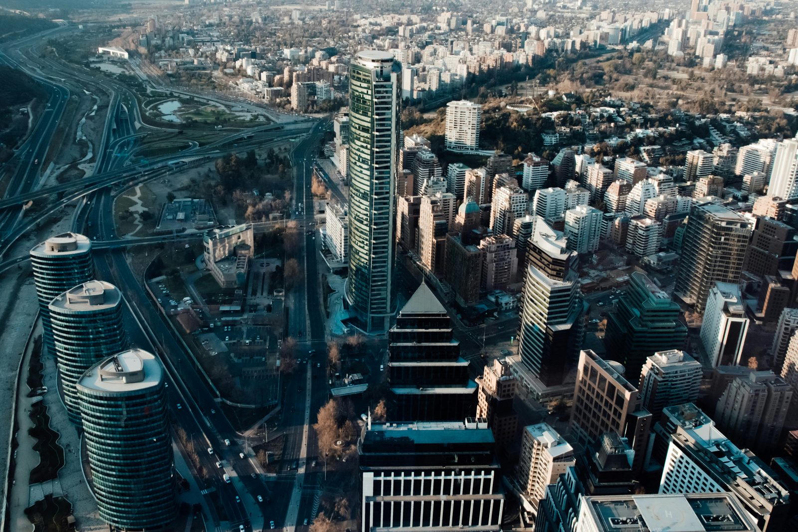 Aerial view of Santiago's financial district, its towers and avenues at dusk